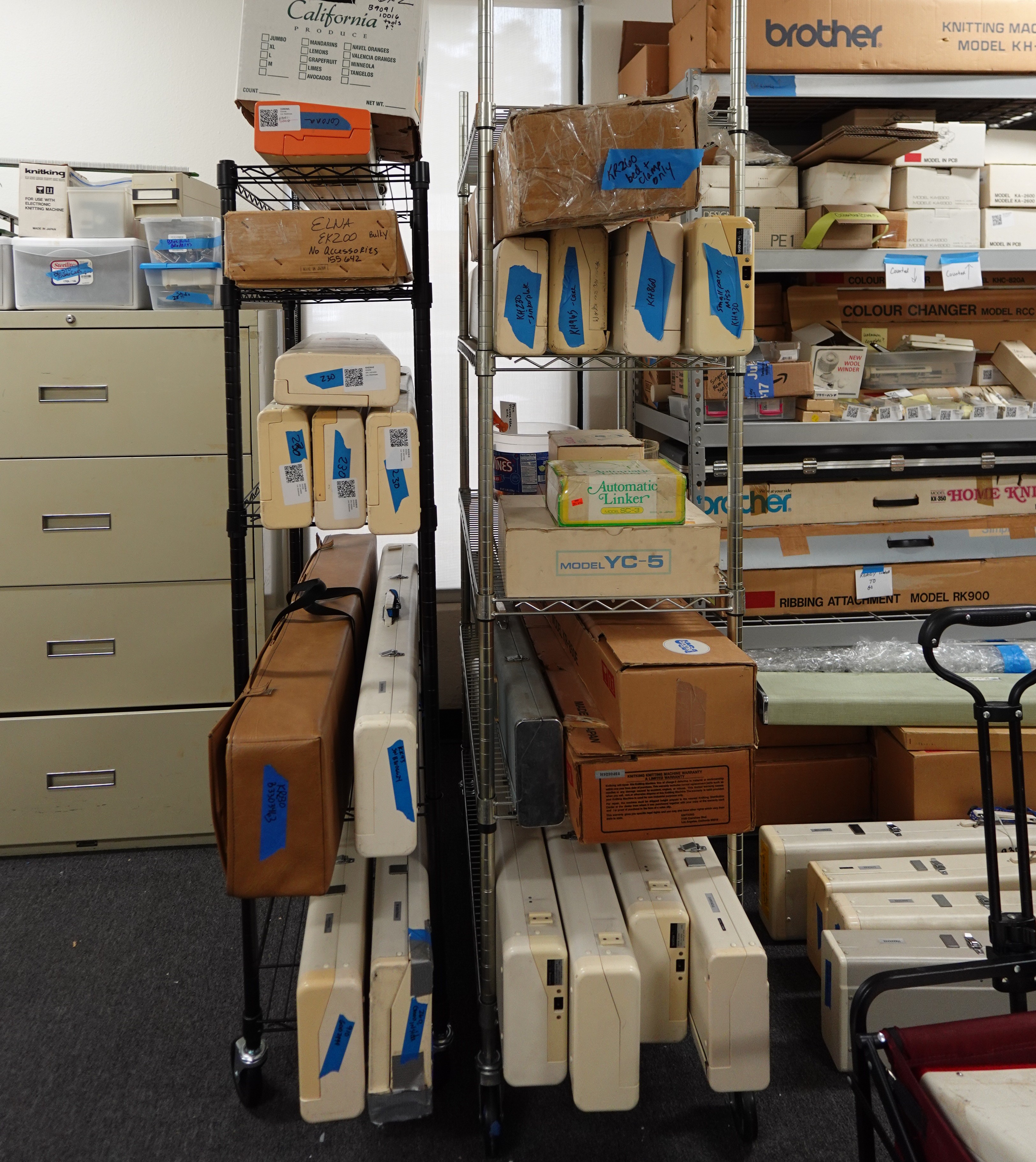 Racks of vintage knitting machines ready for sale